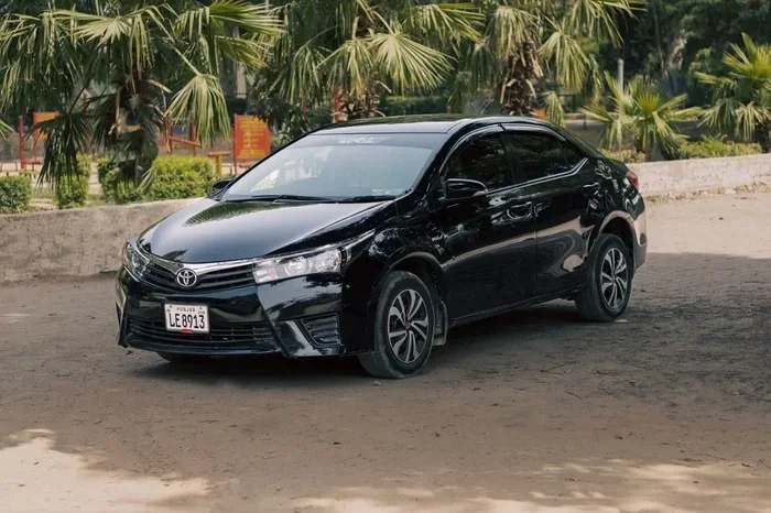 how far will a toyota carolla take me on quarter tank of gas
